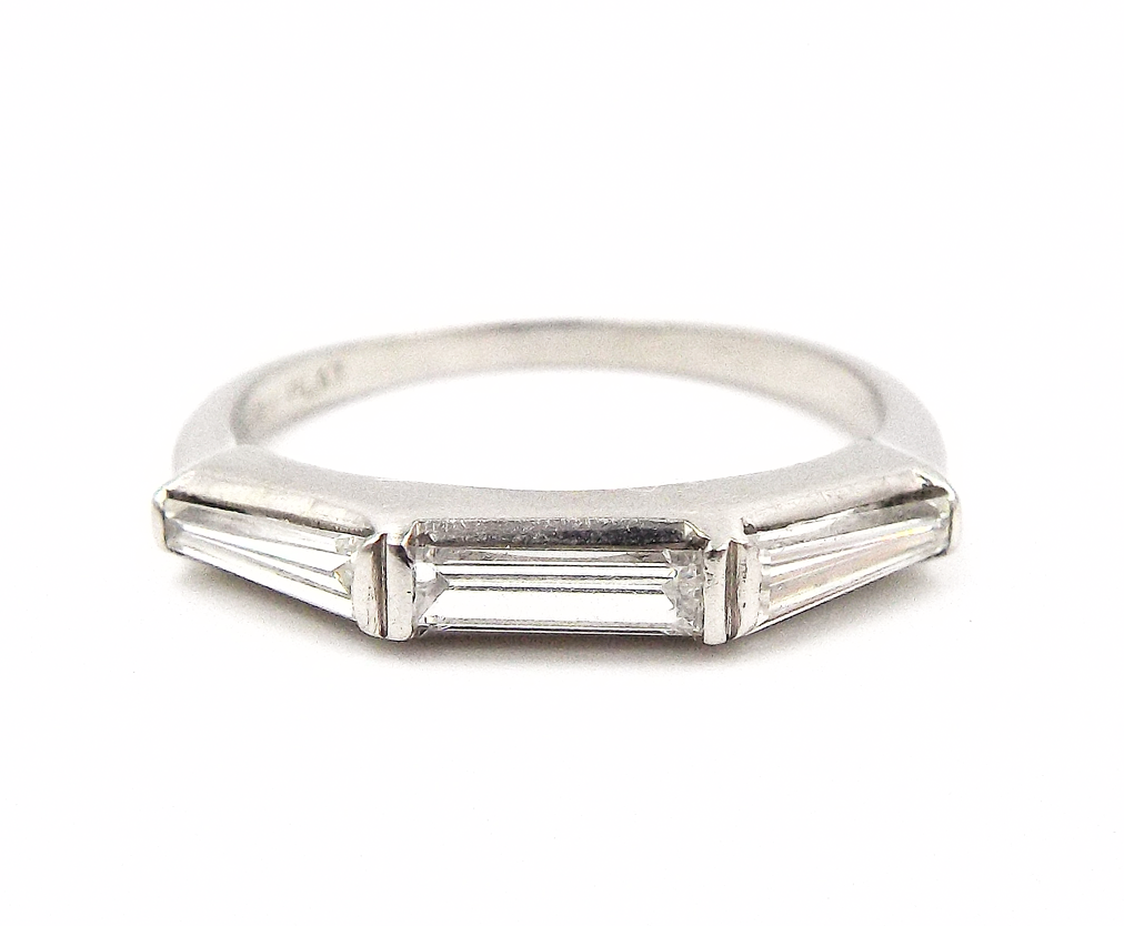 A Pair of Engagement and Wedding Platinum Diamond Rings