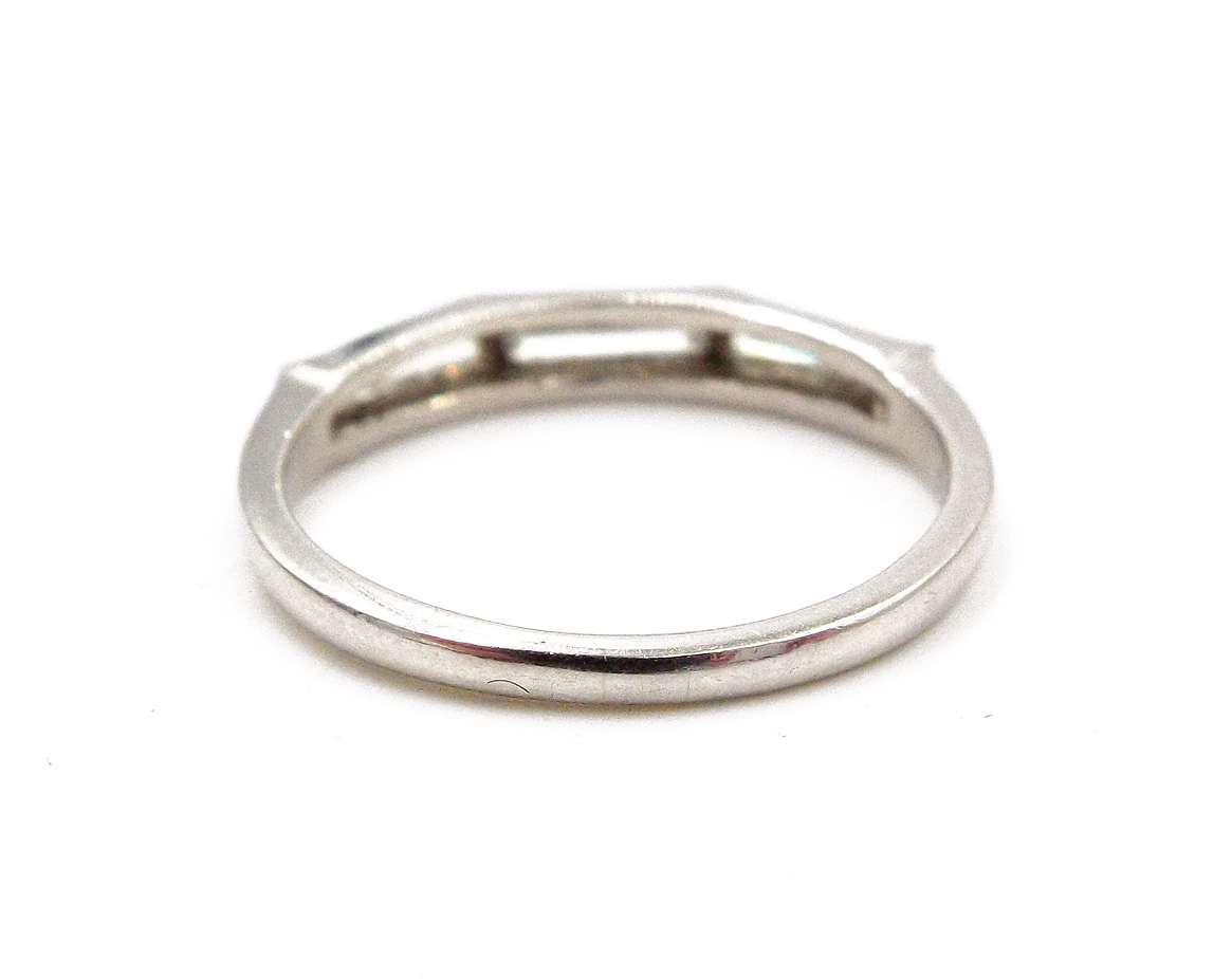 A Pair of Engagement and Wedding Platinum Diamond Rings