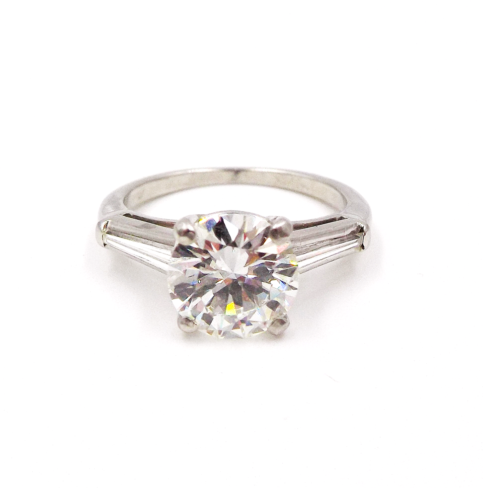 A Pair of Engagement and Wedding Platinum Diamond Rings