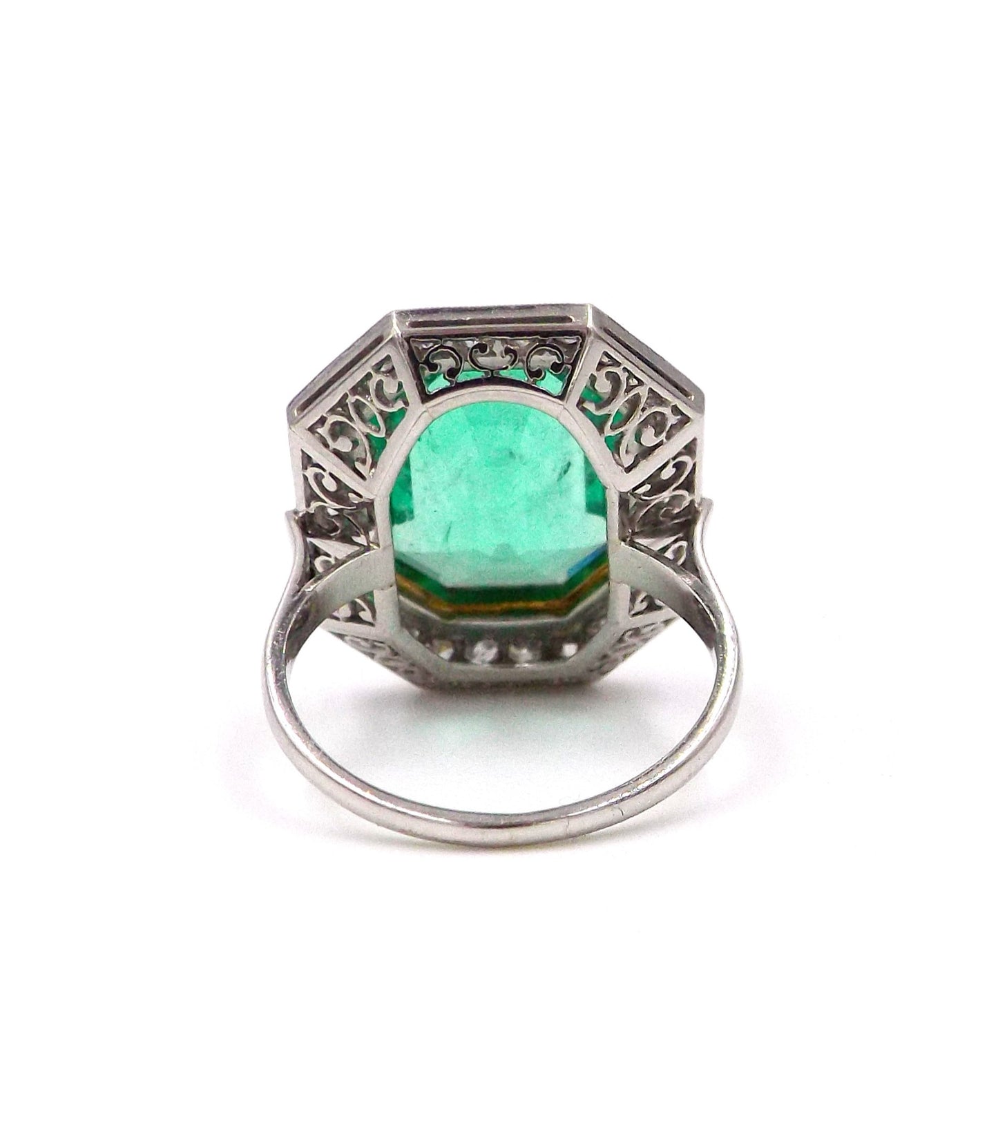 An emerald and diamond ring